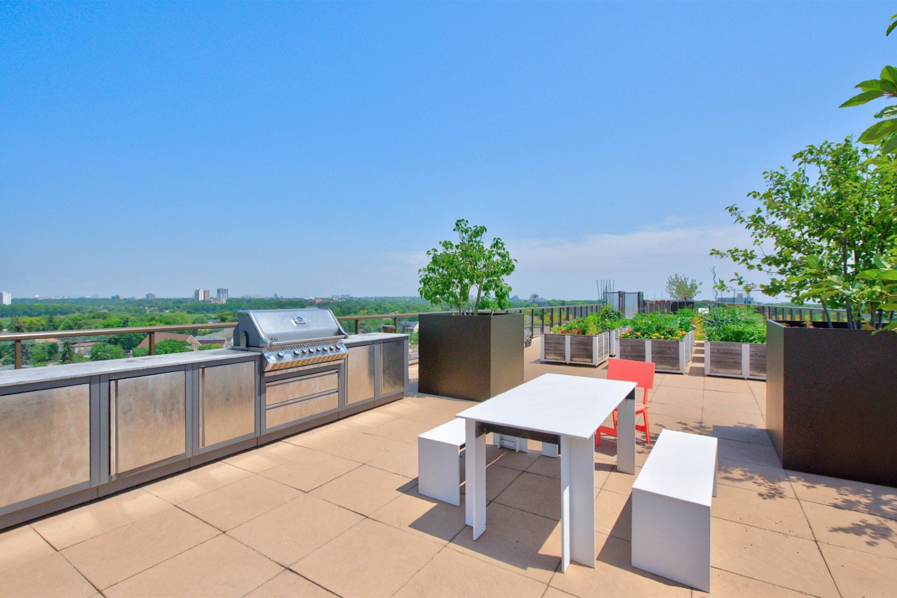 Rooftop terrace with BBQs and dining area